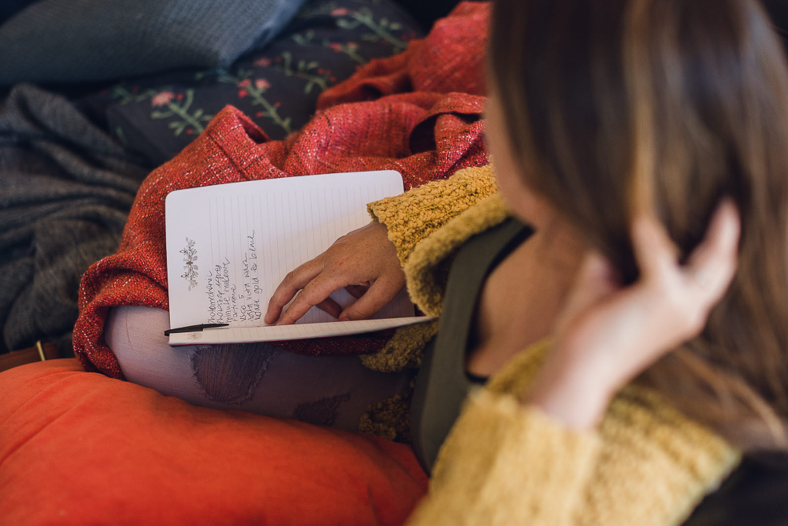 Woman journaling at a Heart Work Retreat